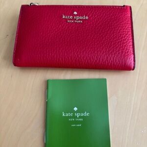 Kate Spade red leather bifold wallet